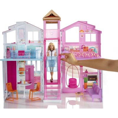 Vue de la façade de la maison de luxe Barbie DLY32.