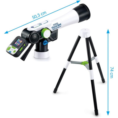 Enfant observant les étoiles avec le télescope VTech dans sa chambre.